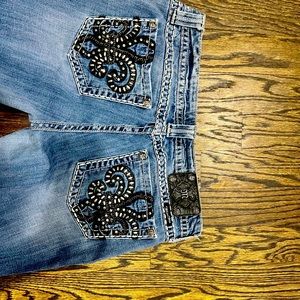 Miss Me jeans. Size is 34 inch waist.A little bit of fraying my at the bottom.
